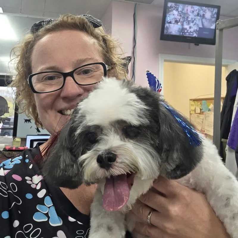 Dana with a freshly groomed dog